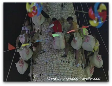 Cheung Chau Bun Festival - Bun grabbing contest Cheung Chau Bun Festival - Bun Grabbing Contest