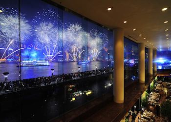 Harbour view room with Convention Center on background at the Regent Hotel in Hong Kong