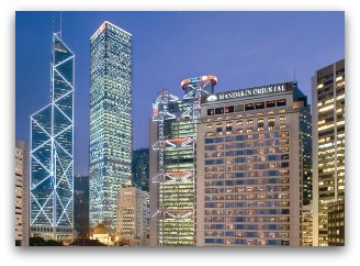 Night view of Mandarin Oriental Hotel in Hong Kong and surrounding cityscape