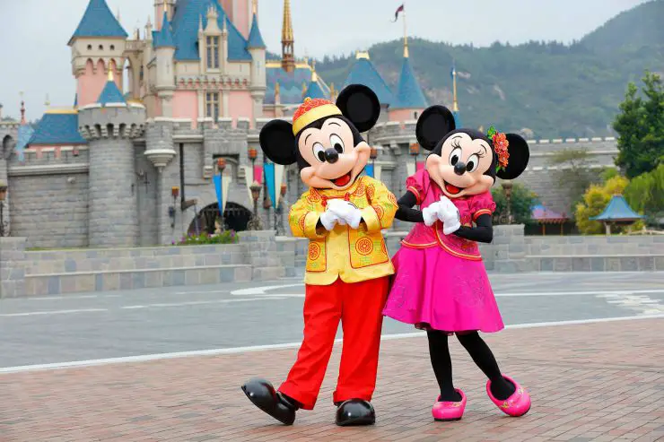 Mickey and Minnie wearing traditional Chinese outfits at Disneyland Hong Kong