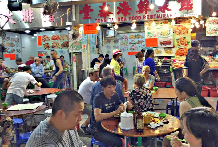 Temple Street Night Market Food Stalls Hong Kong with Picture Menus on the Walls