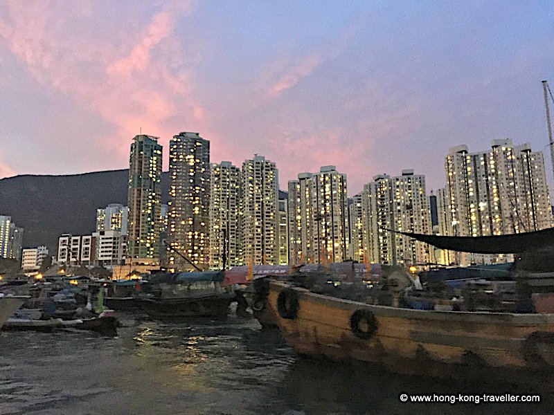 Aberdeen Village Harbour and background highrises at dusk